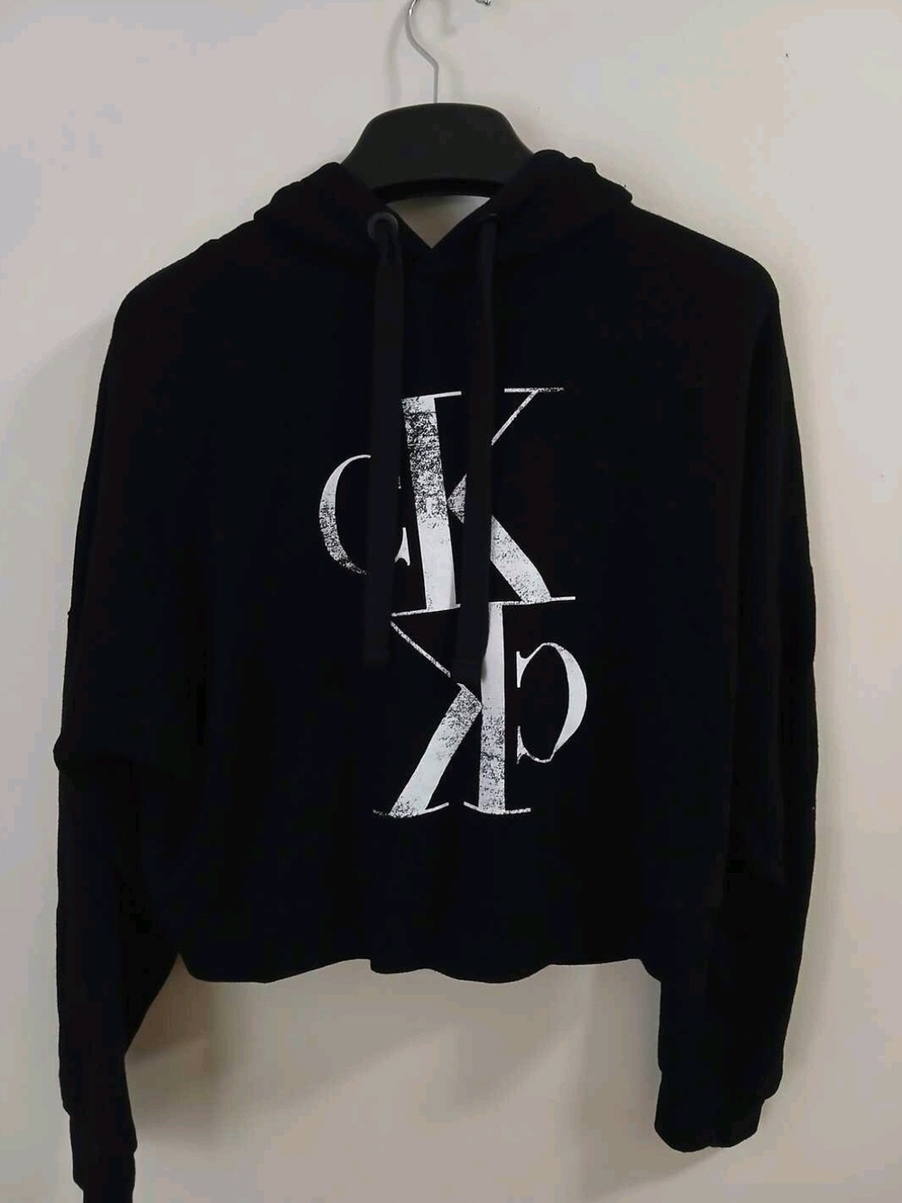 Calvin Klein Cropped Black Hoodie with White Distressed CK Graphic
